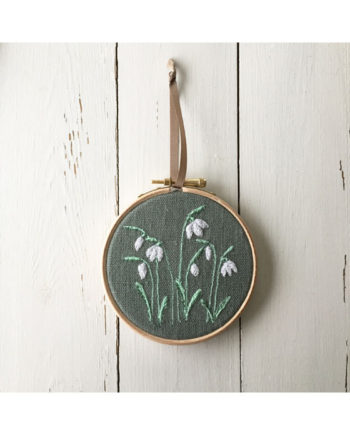 Sarah Becvar embroidered snowdrop hoop