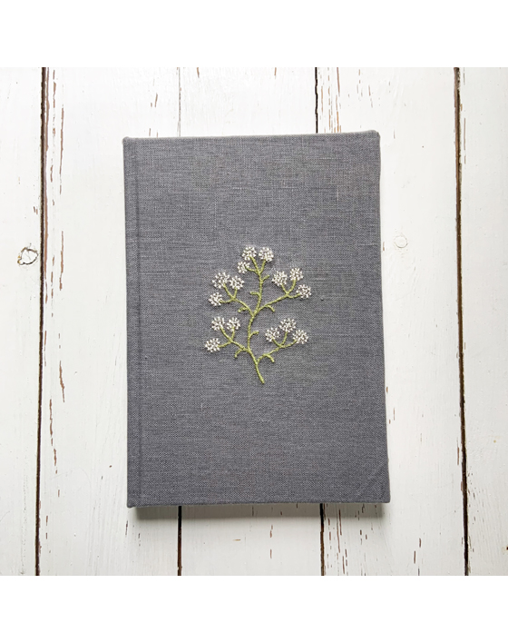 linen bound notebook with freehand machine embroidery by sarah becvar